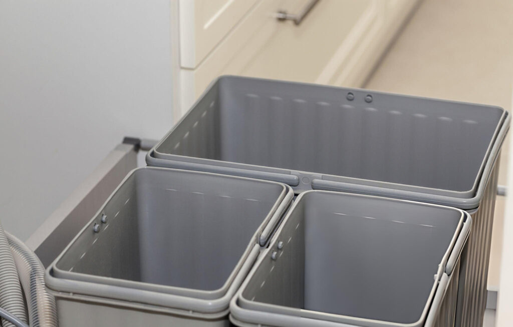 Trash bin pull-out cabinets